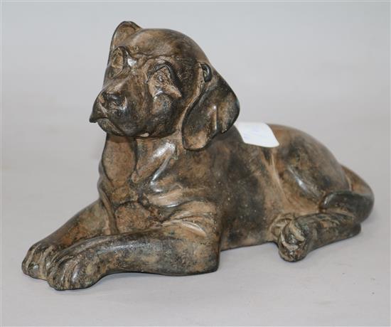 A bronzed model of a dog signed P Chenet 23cm.